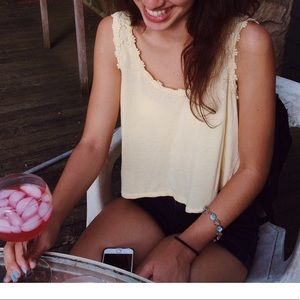 Yellow scooped crop top